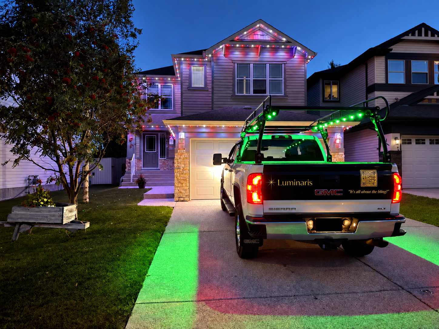 Beautiful home exterior with dramatic permanent lighting against night sky